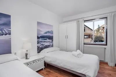 Cama o camas de una habitación en Casa Pelaire Panticosa -tucasaenlospirineos