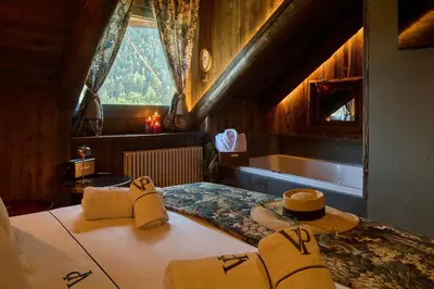 Cama o camas de una habitación en Hotel Valle de Pineta - Las Suites