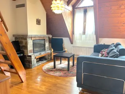 Zona de estar de Apartament bonic i amb altell a Esterri by RURAL D'ÀNEU