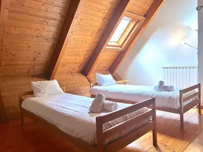 Cama o camas de una habitación en Apartament bonic i amb altell a Esterri by RURAL D'ÀNEU