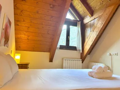 Cama o camas de una habitación en Apartament bonic i amb altell a Esterri by RURAL D'ÀNEU