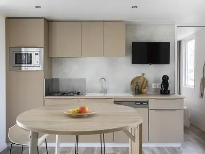 Una cocina o zona de cocina en Mobil-home avec Terrasse - 5 personnes - API-1-52-462