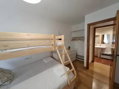 Cama o camas de una habitación en El Tozal, cálido, petfriendly con garaje