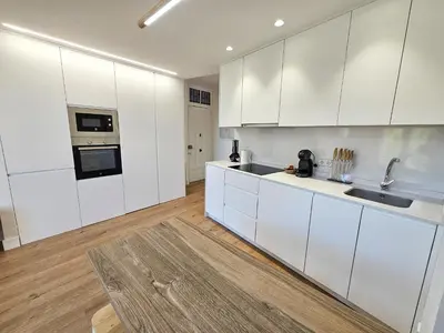 Una cocina o zona de cocina en Apartamentos Zaragoza Reconquista 3000