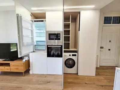 Una cocina o zona de cocina en Apartamentos Zaragoza Reconquista 3000