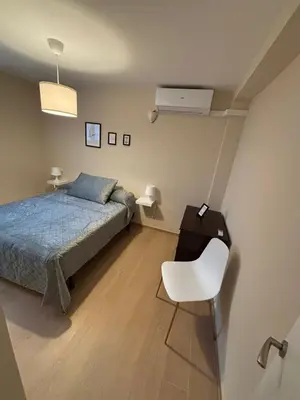 Cama o camas de una habitación en Puente de Piedra