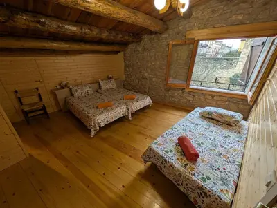 Cama o camas de una habitación en Rustic charm in Àger, a natural paradise