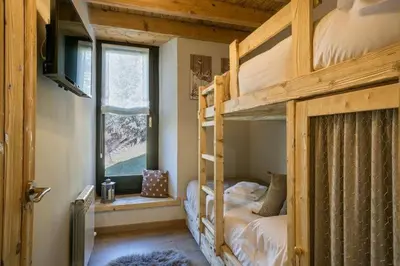 Cama o camas de una habitación en Eth Estel de Salardú--Casa con vistas de ensueño-Fibra Optica,5TV-Gran Chimenea