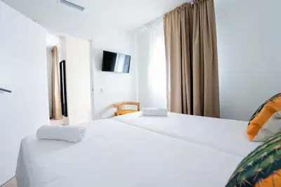 Cama o camas de una habitación en AVA Alojamientos Victoria Arnedo