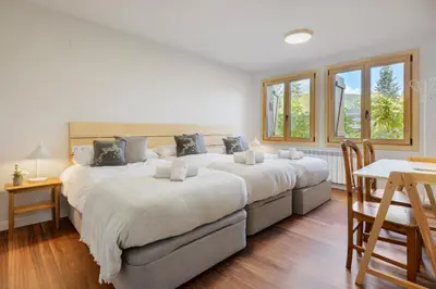 Cama o camas de una habitación en Villa Cinco Vistas Jaca
