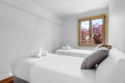Cama o camas de una habitación en Villa Cinco Vistas Jaca