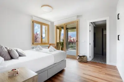 Cama o camas de una habitación en Villa Cinco Vistas Jaca