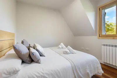 Cama o camas de una habitación en Villa Cinco Vistas Jaca