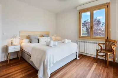 Cama o camas de una habitación en Villa Cinco Vistas Jaca