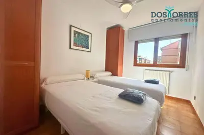 Cama o camas de una habitación en Dos Torres Nicanor Bussines