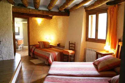 Cama o camas de una habitación en Cal Pallerola