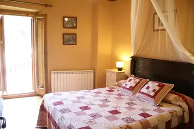 Cama o camas de una habitación en Cal Pallerola