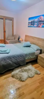 Cama o camas de una habitación en Refugio rural con encanto en el Pirineo