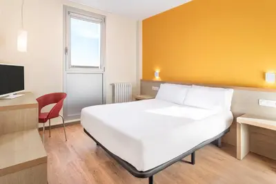 Cama o camas de una habitación en Hotel 280 Zaragoza