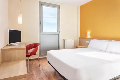 Cama o camas de una habitación en Hotel 280 Zaragoza