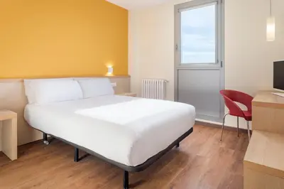 Cama o camas de una habitación en Hotel 280 Zaragoza