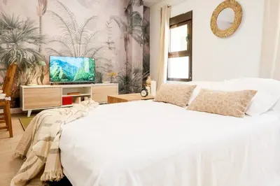 Cama o camas de una habitación en Villa Forest Ideal Familias Casco Histórico Balcón