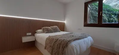 Cama o camas de una habitación en El Llano Descanso