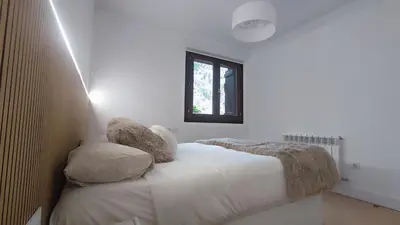 Cama o camas de una habitación en El Llano Descanso