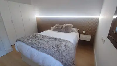 Cama o camas de una habitación en El Llano Descanso