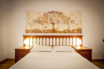 Cama o camas de una habitación en El Corazón de San Juan