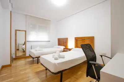 Cama o camas de una habitación en El Corazón de San Juan