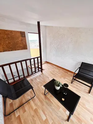 Zona de estar de Lo Corner House