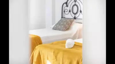 Cama o camas de una habitación en The Comfortable Apartment by Clabao