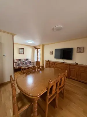 Una televisión o centro de entretenimiento en Casa Manu