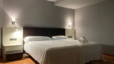 Cama o camas de una habitación en Hotel Villa de Andosilla