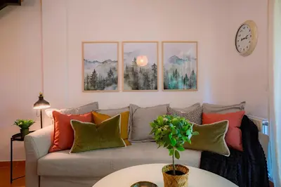 Zona de estar de Pinaserena Chic duplex with garden in Villanúa