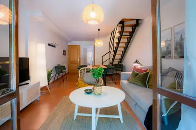 Zona de estar de Pinaserena Chic duplex with garden in Villanúa