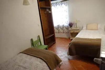 Cama o camas de una habitación en Apartamentos La Dama Azul