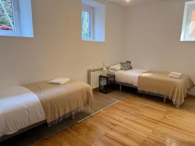 Cama o camas de una habitación en Apartamentos Pirineo
