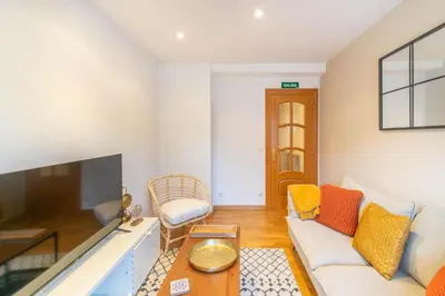 Zona de estar de Acogedor apartamento ideal para familias