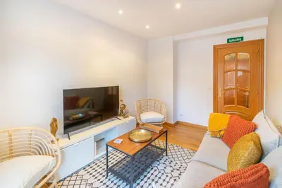 Una televisión o centro de entretenimiento en Acogedor apartamento ideal para familias