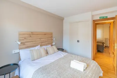 Cama o camas de una habitación en Acogedor apartamento ideal para familias