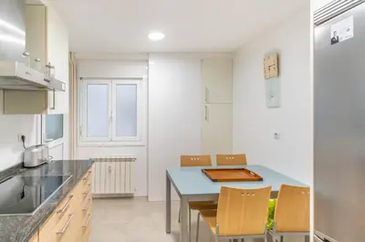Una cocina o zona de cocina en Acogedor apartamento ideal para familias