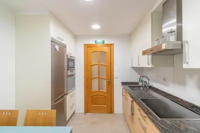 Una cocina o zona de cocina en Acogedor apartamento ideal para familias