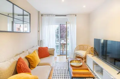 Una televisión o centro de entretenimiento en Acogedor apartamento ideal para familias