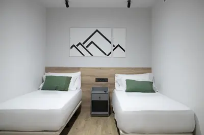 Cama o camas de una habitación en Inkigo Rooms
