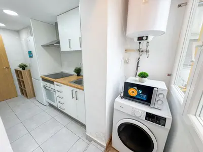 Una cocina o zona de cocina en El Marqués del Pilar - Turistea