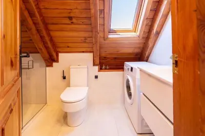 Un baño de Las casitas de mache - LAROCA