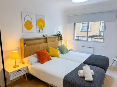 Cama o camas de una habitación en El Ebro del Pilar - Turistea