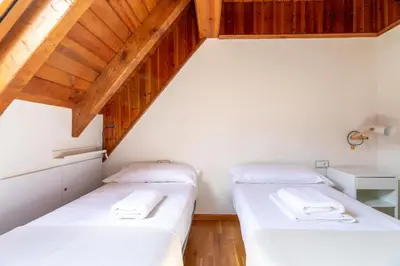 Cama o camas de una habitación en Las casitas de mache - 5F